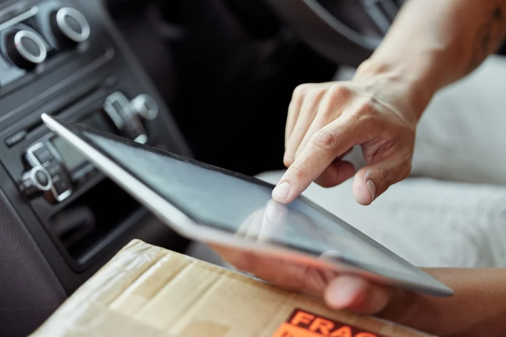 person touching tablet