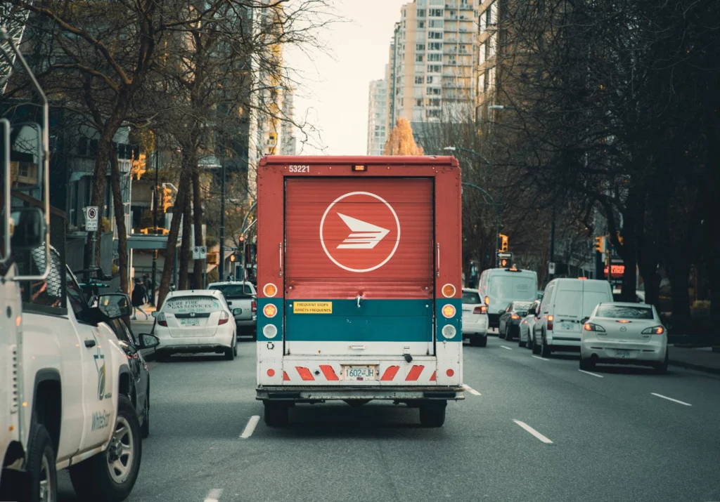 Back of a van on a busy city street