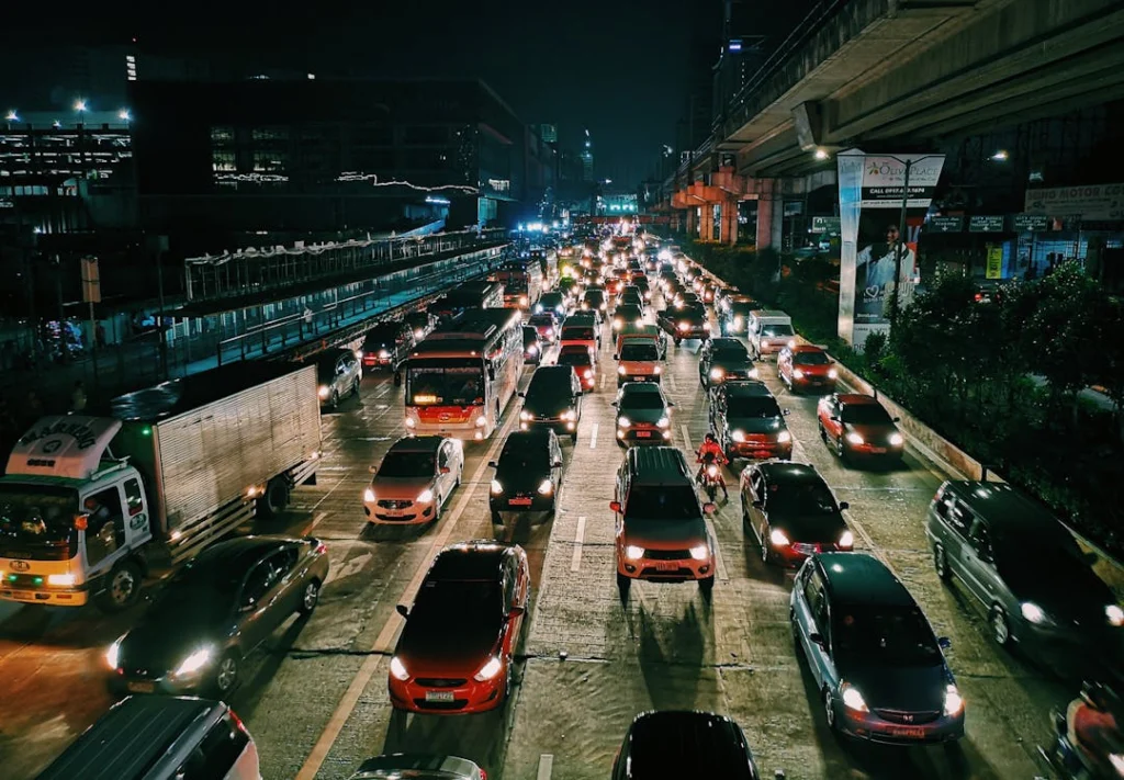 Vehicles on a congested urban highway at night